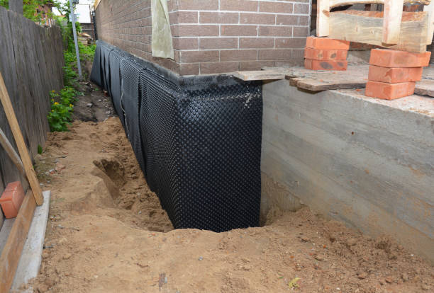 Happy homeowners after waterproofing job in Perkiomenville